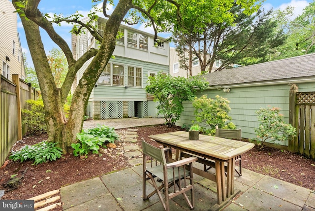 view of patio / terrace featuring outdoor dining space and a fenced backyard
