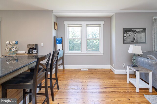 417 Princeton Ave, Cherry Hill, NJ 08002 - dining area with light wood finished floors, baseboards, and crown molding