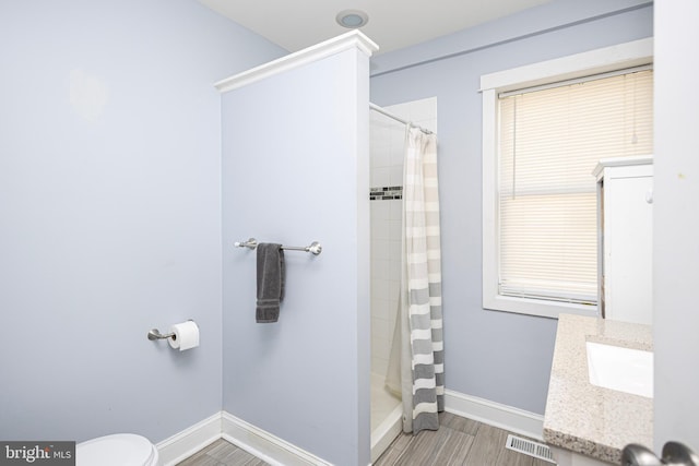 417 Princeton Ave, Cherry Hill, NJ 08002 - bathroom with a sink, wood finished floors, baseboards, and a shower with curtain