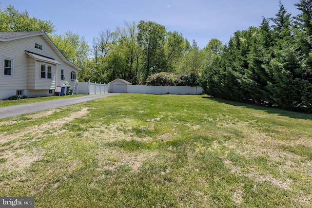 417 Princeton Ave, Cherry Hill, NJ 08002 - view of yard featuring driveway, a detached garage, and an outdoor structure
