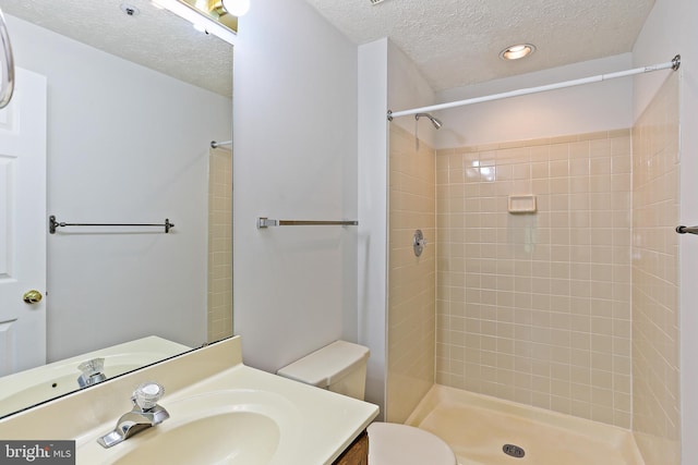 19208 Cross Ridge Dr, Germantown, MD 20874 - full bath with a textured ceiling, toilet, vanity, a stall shower, and recessed lighting