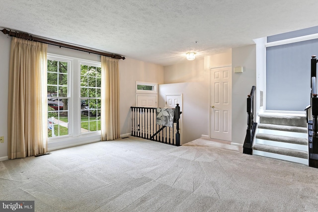 19208 Cross Ridge Dr, Germantown, MD 20874 - spare room with carpet floors, a textured ceiling, and baseboards