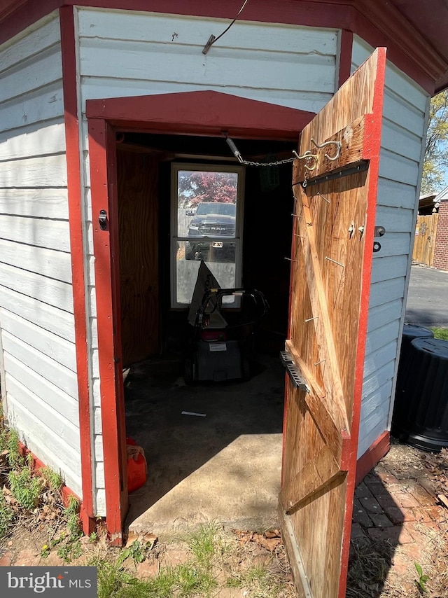 view of outbuilding featuring central air condition unit