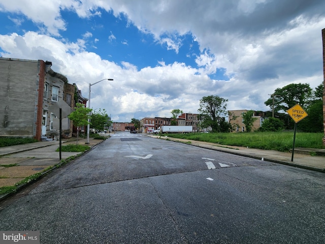 1904 Kennedy Ave, Baltimore, MD 21218 - view of road with street lighting, curbs, sidewalks, a residential view, and traffic signs