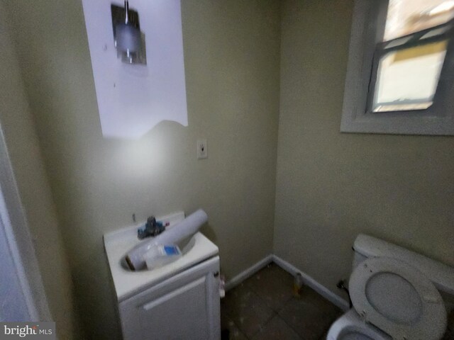1904 Kennedy Ave, Baltimore, MD 21218 - bathroom featuring baseboards, tile patterned floors, and toilet