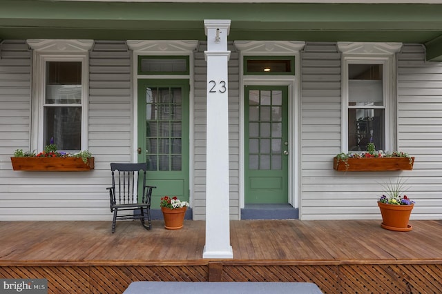 property entrance featuring covered porch