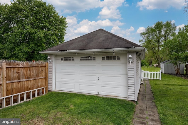detached garage with fence