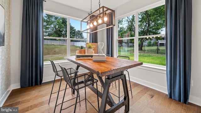 409 Crownleaf Dr, Middletown, DE 19709 - dining area featuring light wood-style flooring, a wealth of natural light, and baseboards