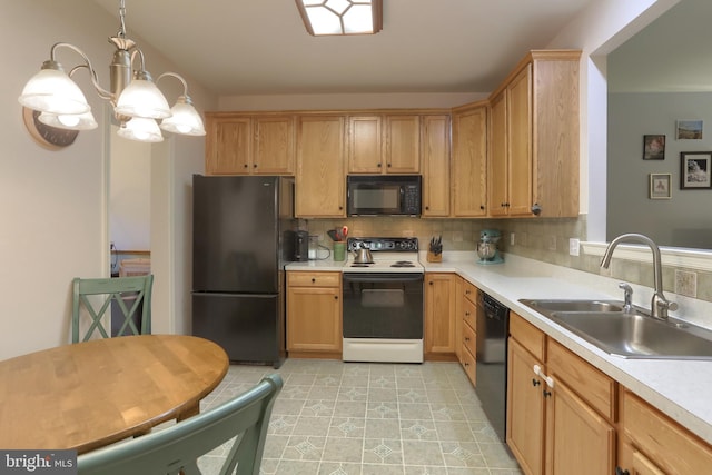 kitchen with black appliances, a sink, light countertops, a chandelier, and backsplash