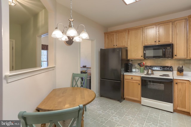 kitchen with black appliances, a chandelier, light countertops, decorative backsplash, and hanging light fixtures
