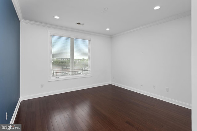 unfurnished room with baseboards, dark wood finished floors, crown molding, and recessed lighting