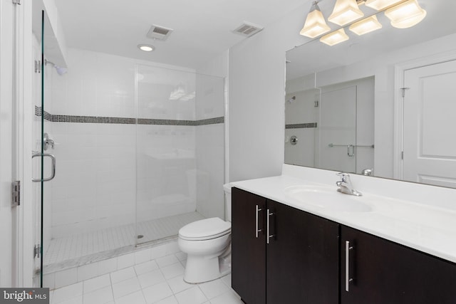 full bathroom with tile patterned flooring, toilet, vanity, a stall shower, and recessed lighting