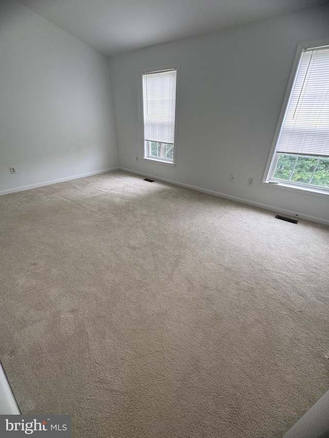 515 Primus Ct, Frederick, MD 21703 - carpeted spare room featuring healthy amount of natural light and baseboards
