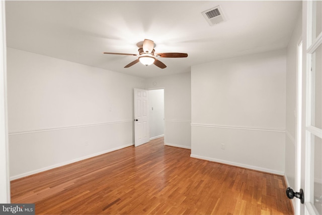 11080 Burwell Rd, Nokesville, VA 20181 - empty room featuring a ceiling fan, wood finished floors, and baseboards