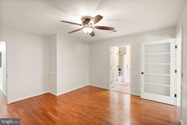 11080 Burwell Rd, Nokesville, VA 20181 - empty room with a ceiling fan, wood finished floors, and baseboards