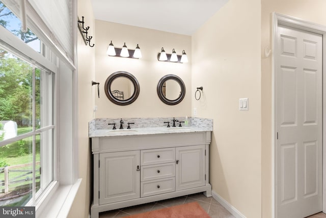 11080 Burwell Rd, Nokesville, VA 20181 - full bath with double vanity, tile patterned flooring, and baseboards