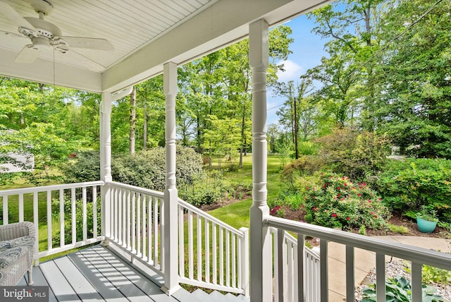 11080 Burwell Rd, Nokesville, VA 20181 - wooden deck with a ceiling fan, view of scattered trees, and a porch