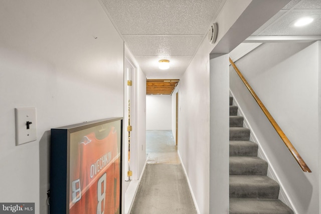 11080 Burwell Rd, Nokesville, VA 20181 - hall with carpet floors, stairs, a textured ceiling, and baseboards