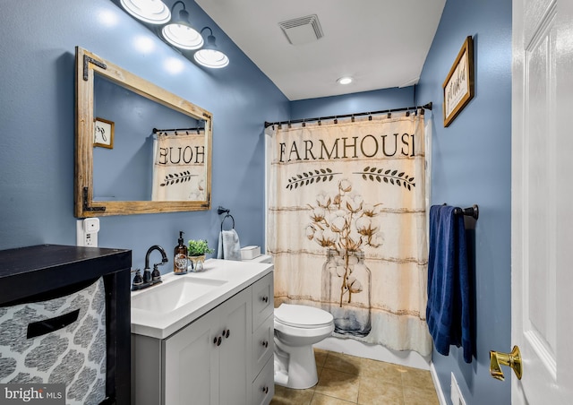 full bath featuring toilet, vanity, tile patterned flooring, and a shower with curtain