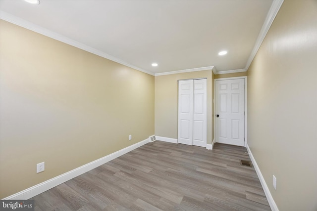 3605 Essex Ln, Philadelphia, PA 19114 - unfurnished bedroom featuring wood finished floors, recessed lighting, baseboards, a closet, and crown molding