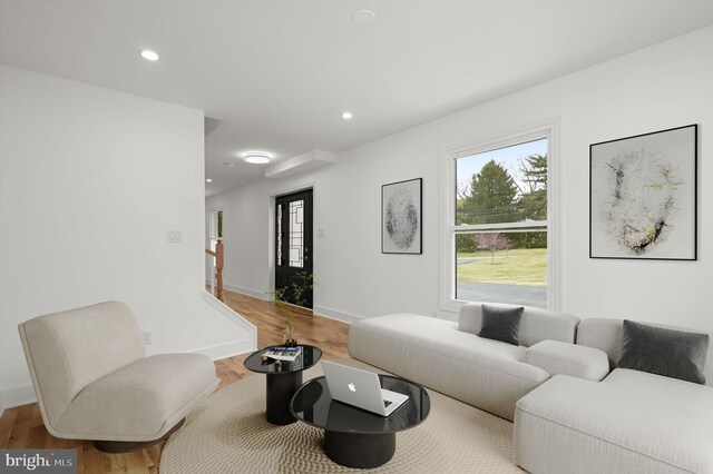 9828 Watts Branch Dr, Rockville, MD 20850 - living room with wood finished floors, recessed lighting, and baseboards