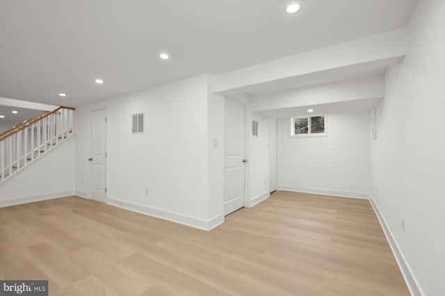 9828 Watts Branch Dr, Rockville, MD 20850 - below grade area with recessed lighting, stairway, and baseboards