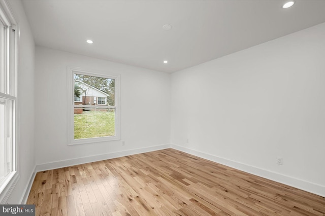 9828 Watts Branch Dr, Rockville, MD 20850 - spare room with light wood-style flooring, recessed lighting, and baseboards