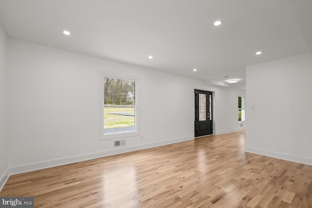 9828 Watts Branch Dr, Rockville, MD 20850 - empty room with light wood-type flooring, recessed lighting, and baseboards