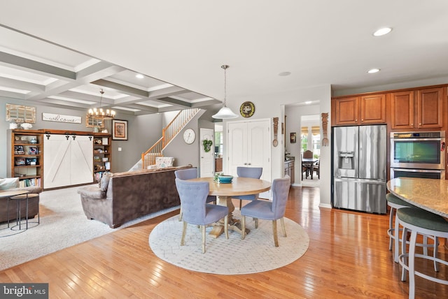 13859 Barrymore Ct, Gainesville, VA 20155 - dining room featuring light wood finished floors, beam ceiling, recessed lighting, stairs, and a chandelier