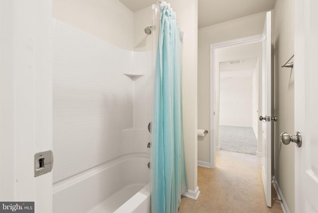 13859 Barrymore Ct, Gainesville, VA 20155 - full bath with shower / bathtub combination with curtain and baseboards