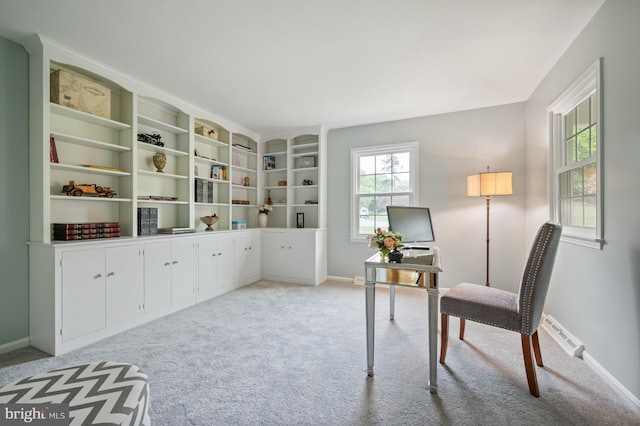 living area with light carpet, baseboards, and visible vents
