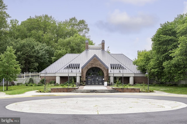 view of building exterior featuring fence
