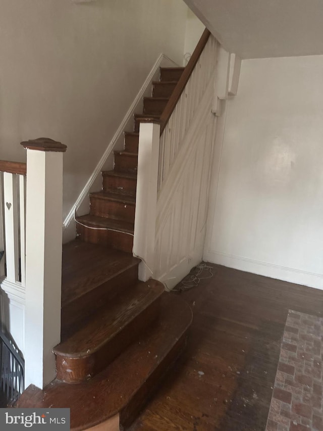 235 E Price St, Philadelphia, PA 19144 - staircase featuring baseboards and wood finished floors