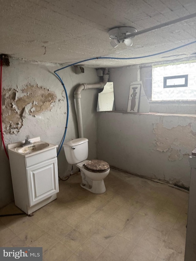 235 E Price St, Philadelphia, PA 19144 - bathroom with vanity, toilet, and tile patterned floors