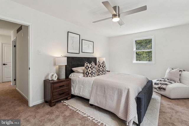 bedroom featuring carpet, baseboards, and ceiling fan