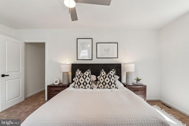 bedroom with carpet, baseboards, and ceiling fan