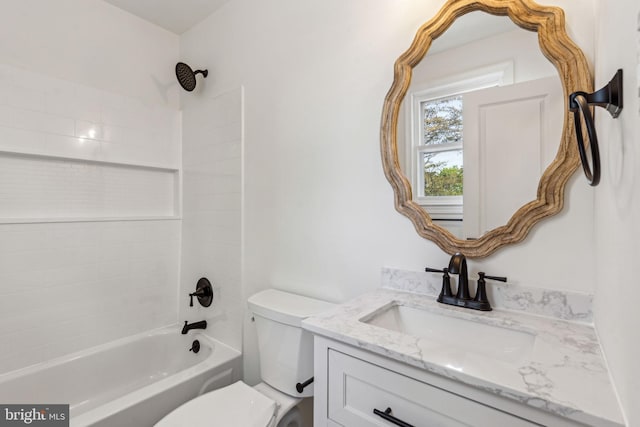 full bath with toilet, vanity, and tub / shower combination