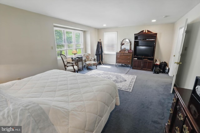 carpeted bedroom featuring recessed lighting
