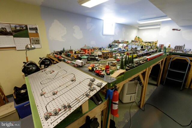 misc room with a workshop area