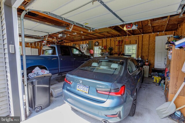 garage featuring a garage door opener