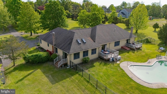 view from above of property featuring a tree filled landscape