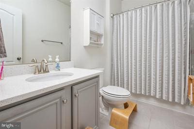 2038 Twisted Oak Pl, Hanover, MD 21076 - bathroom with vanity, toilet, a shower with shower curtain, and tile patterned flooring