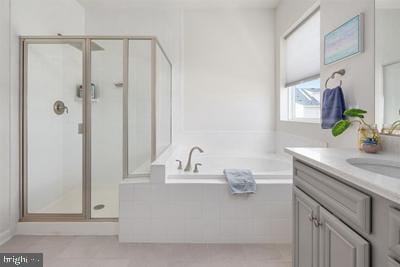2038 Twisted Oak Pl, Hanover, MD 21076 - bathroom with a shower stall, tile patterned floors, vanity, and a bath