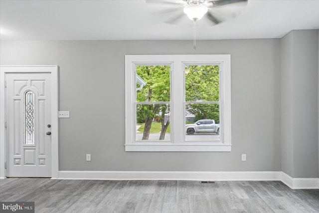 4911 Fox St, College Park, MD 20740 - foyer entrance with baseboards, a ceiling fan, visible vents, and wood finished floors