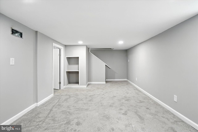 4911 Fox St, College Park, MD 20740 - finished below grade area featuring baseboards, recessed lighting, and carpet