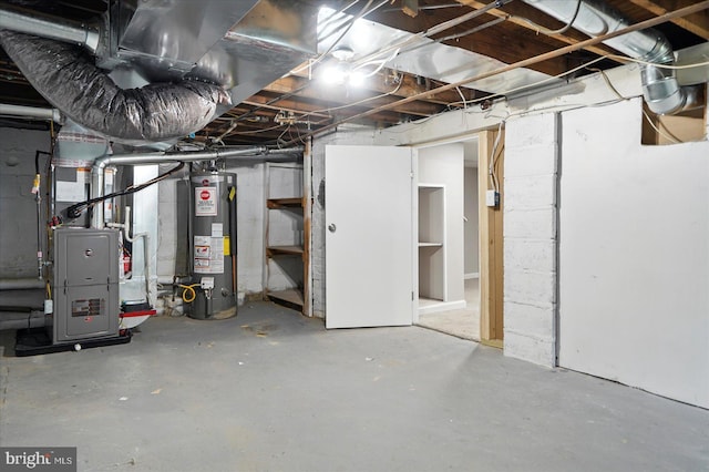 4911 Fox St, College Park, MD 20740 - unfinished basement with water heater and heating unit
