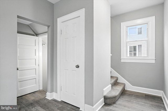 4911 Fox St, College Park, MD 20740 - staircase featuring baseboards and wood finished floors