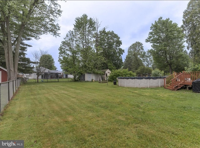 730 Cheryl Dr, Warminster, PA 18974 - view of yard with a wooden deck and a covered pool