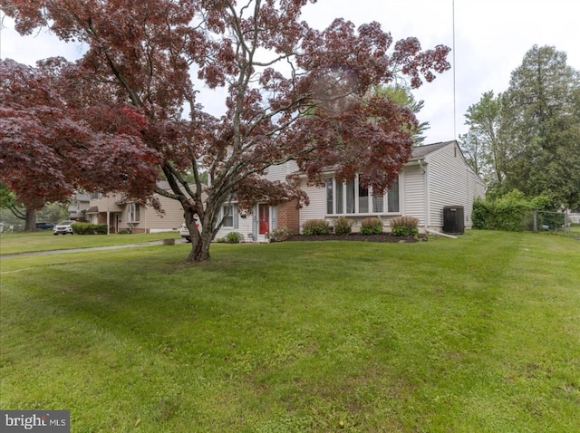 730 Cheryl Dr, Warminster, PA 18974 - view of property hidden behind natural elements featuring a front yard and cooling unit
