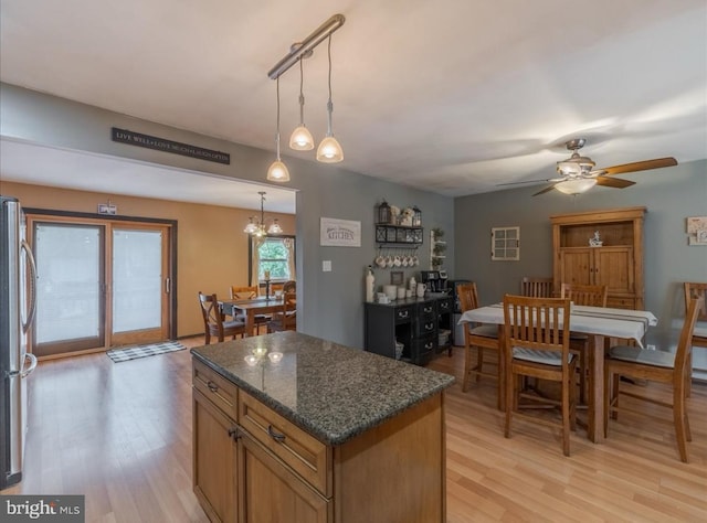 730 Cheryl Dr, Warminster, PA 18974 - kitchen featuring light wood-style flooring, a kitchen island, ceiling fan, and freestanding refrigerator